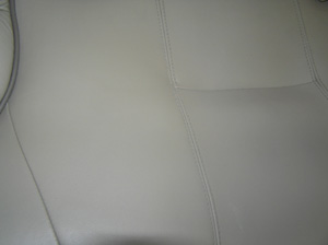 Scratched leather seat - after